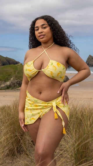 Mini lemon print sarong with yellow cotton tassel ties.