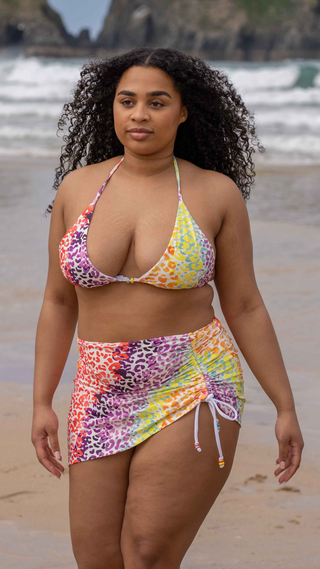 Rainbow drawstring cover-up skirt with ceramic bead detailing.